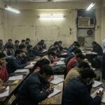 students preparing CUET exam coaching classroom books laptop india
