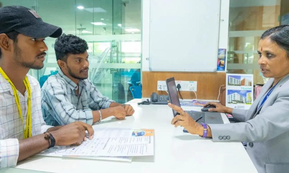 Students participating in university admission and counselling activities in India.
