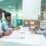 Students participating in university admission and counselling activities in India.