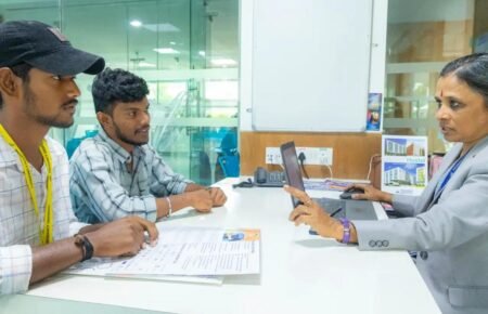 Students participating in university admission and counselling activities in India.