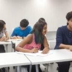 College students participating in a skill development training session.