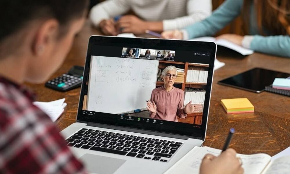 hybrid classroom students laptop smart board teacher digital learning India