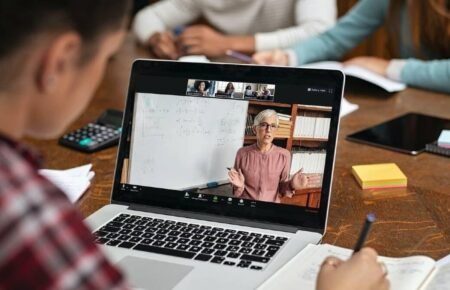 hybrid classroom students laptop smart board teacher digital learning India