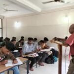 students studying classroom coaching exam preparation india government school