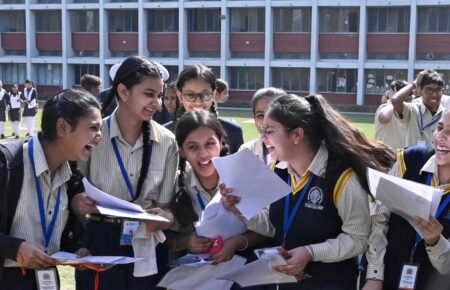 Indian students checking CBSE Class 12 board examination results online