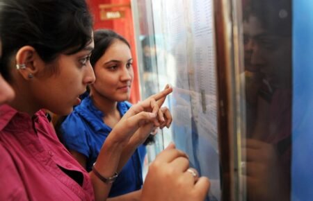 Students checking and celebrating CBSE Class 12 Results 2026