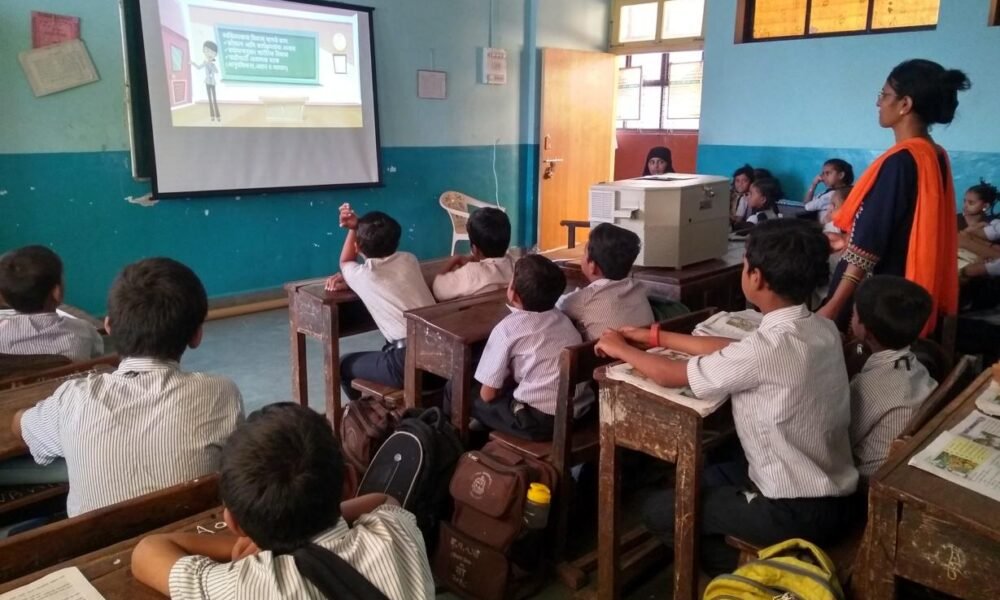 Students using digital classroom technology in Indian schools