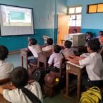 Students using digital classroom technology in Indian schools