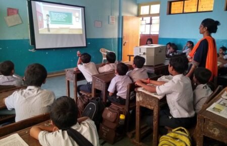 Students using digital classroom technology in Indian schools