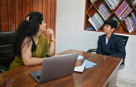 school counsellor talking student mental wellness classroom india