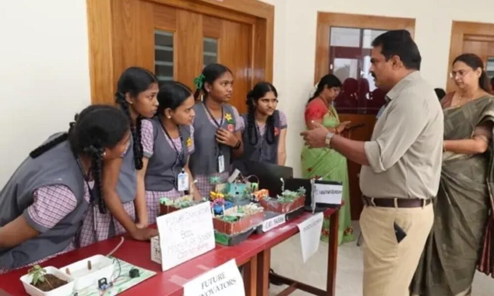 Students participating in an entrepreneurship and innovation club activity at school.