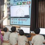 Students attending a cyber safety awareness session in a school.