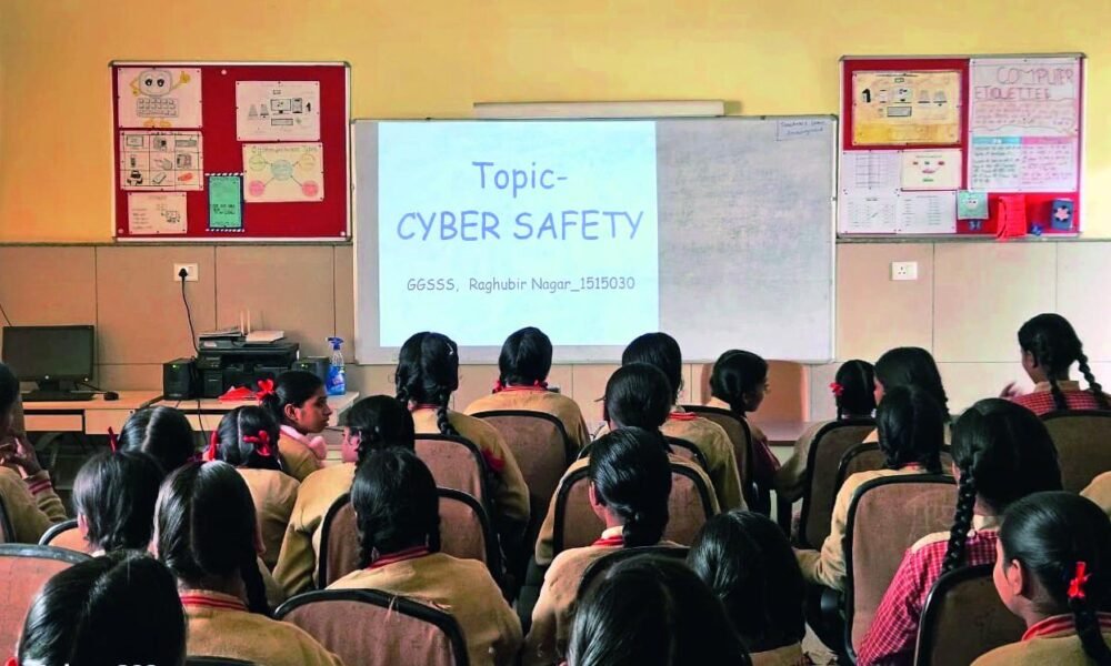 Students attending a cyber safety awareness session in a Delhi school.