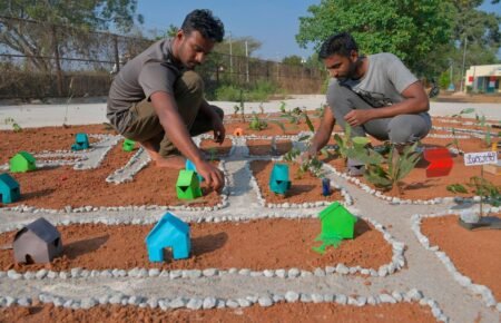 Students learning about modern agriculture and farming practices during an educational programme.