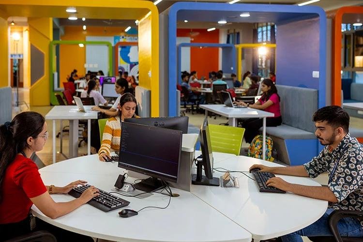 University students engaged in research and innovation activities.