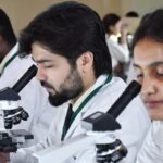 University students engaged in research and innovation activities.