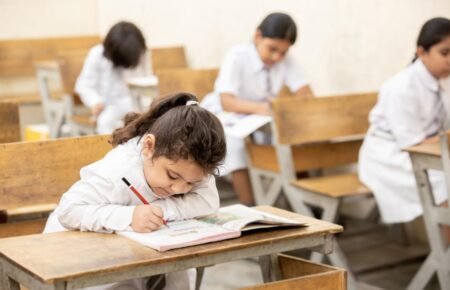 Students and teachers participating in classroom learning activities.