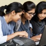 Students checking their Class 10 examination results online.