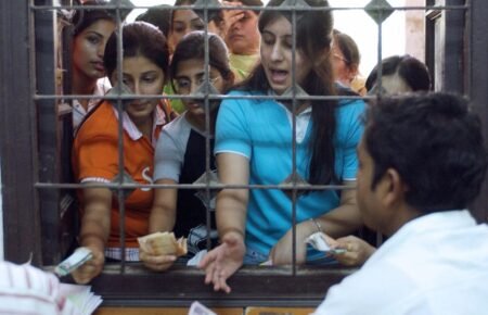 Students participating in university admission and counselling activities in India.