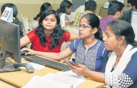 Engineering aspirants checking their JoSAA seat allotment results online.