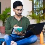 College students accessing online learning courses through a digital platform.