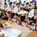 Students appearing for a CBSE Class 12 board examination.
