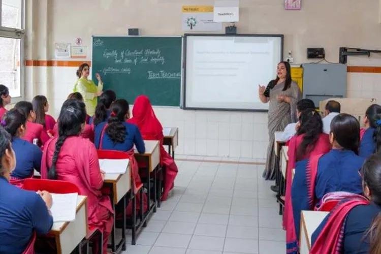 Students attending a teacher education programme in a college classroom.
